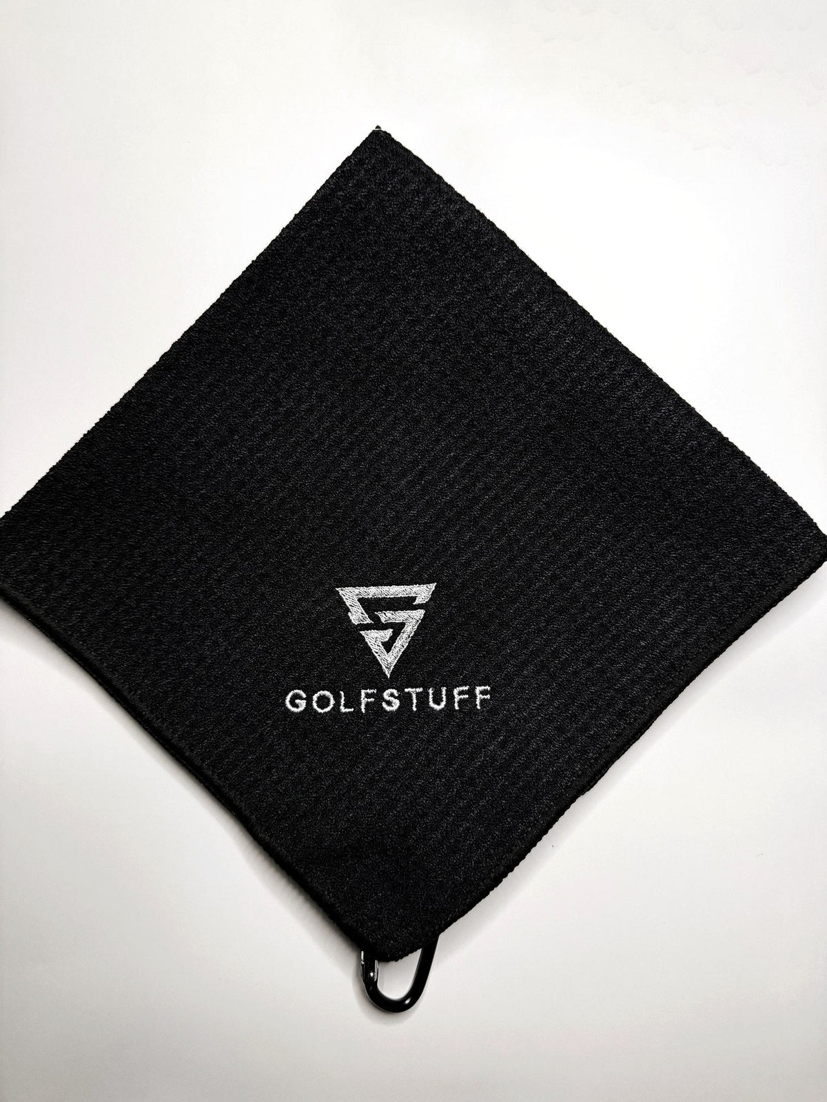 Golfstuff waffle-knit towel with embroidered logo and clip